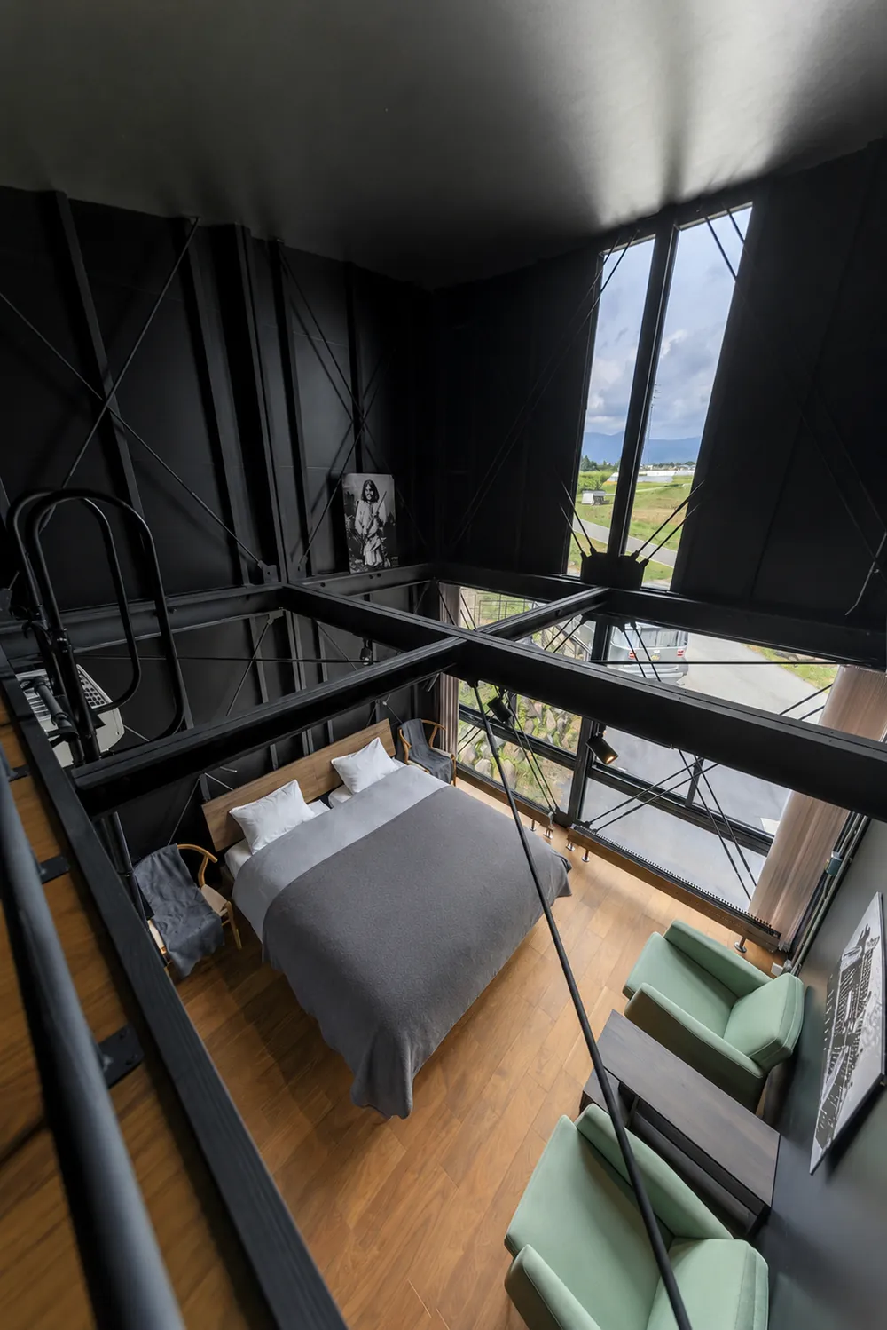 The bedroom seen from the open loft above